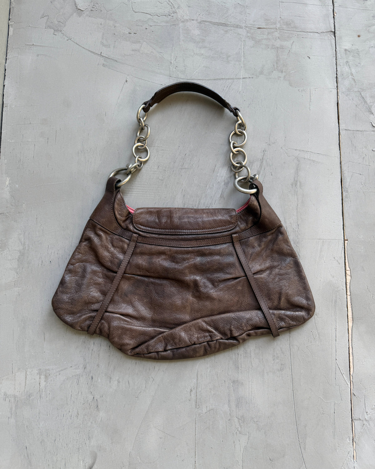 Kenzo Brown Leather Shoulder Bag-on a concrete background