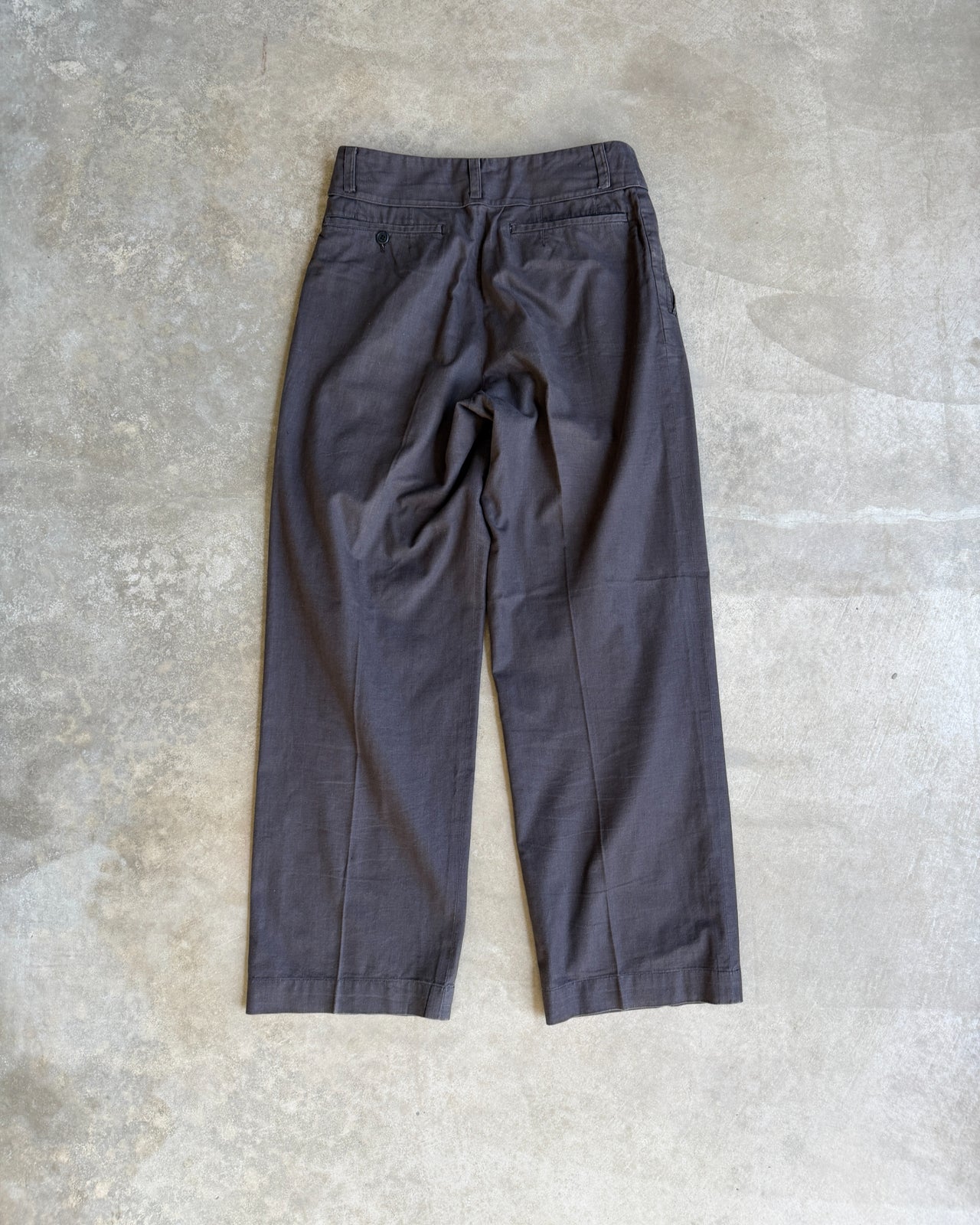 Issey Miyake Men Linen Blend Wide Leg Trousers – M-on a concrete background