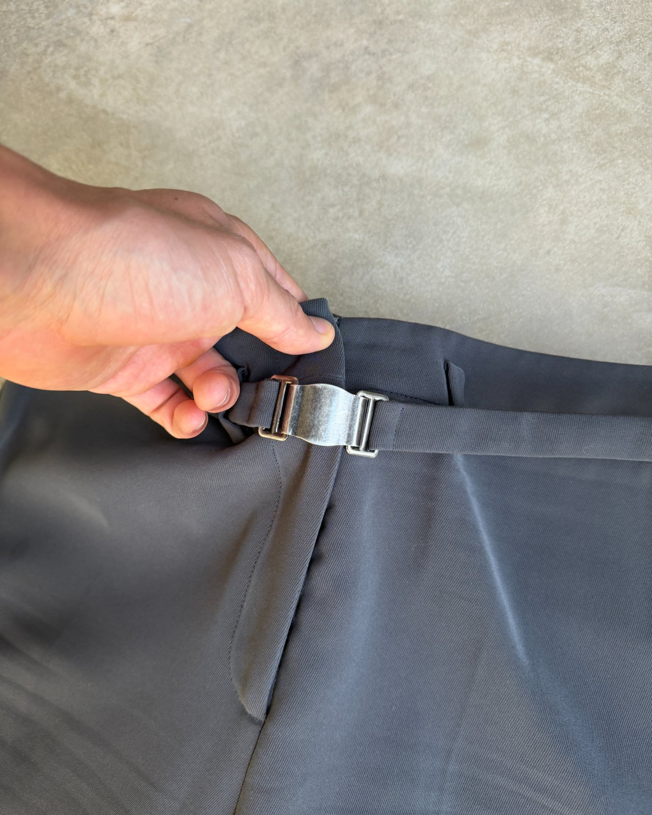 Giorgio Armani Grey Polyester Wide Leg Trousers – M-on a concrete background