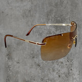 DIOR BROWN RIMLESS WRAP SUNGLASSES