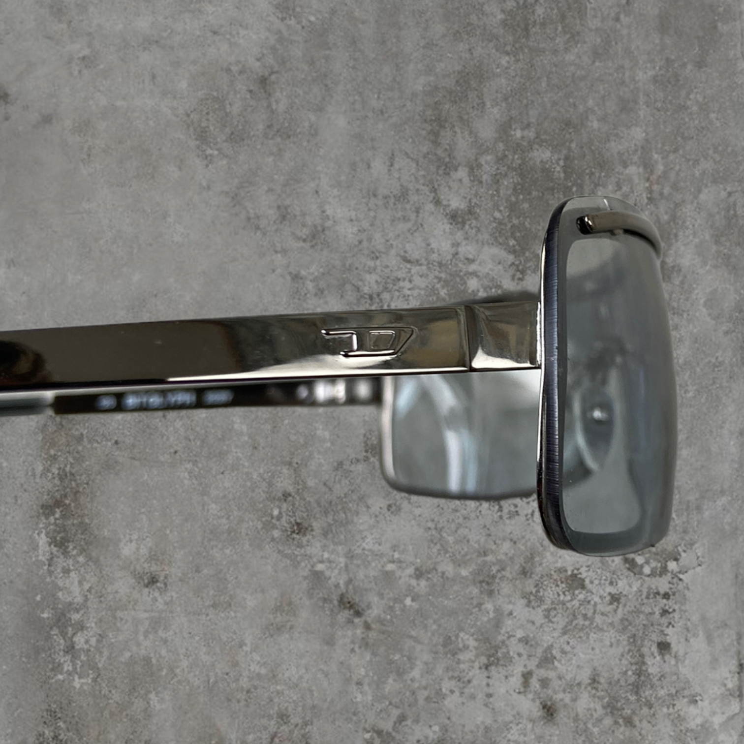 DIESEL RIMLESS WRAP SPORT SUNGLASSES