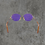 DIOR PURPLE AND GOLD RIMLESS SUNGLASSES