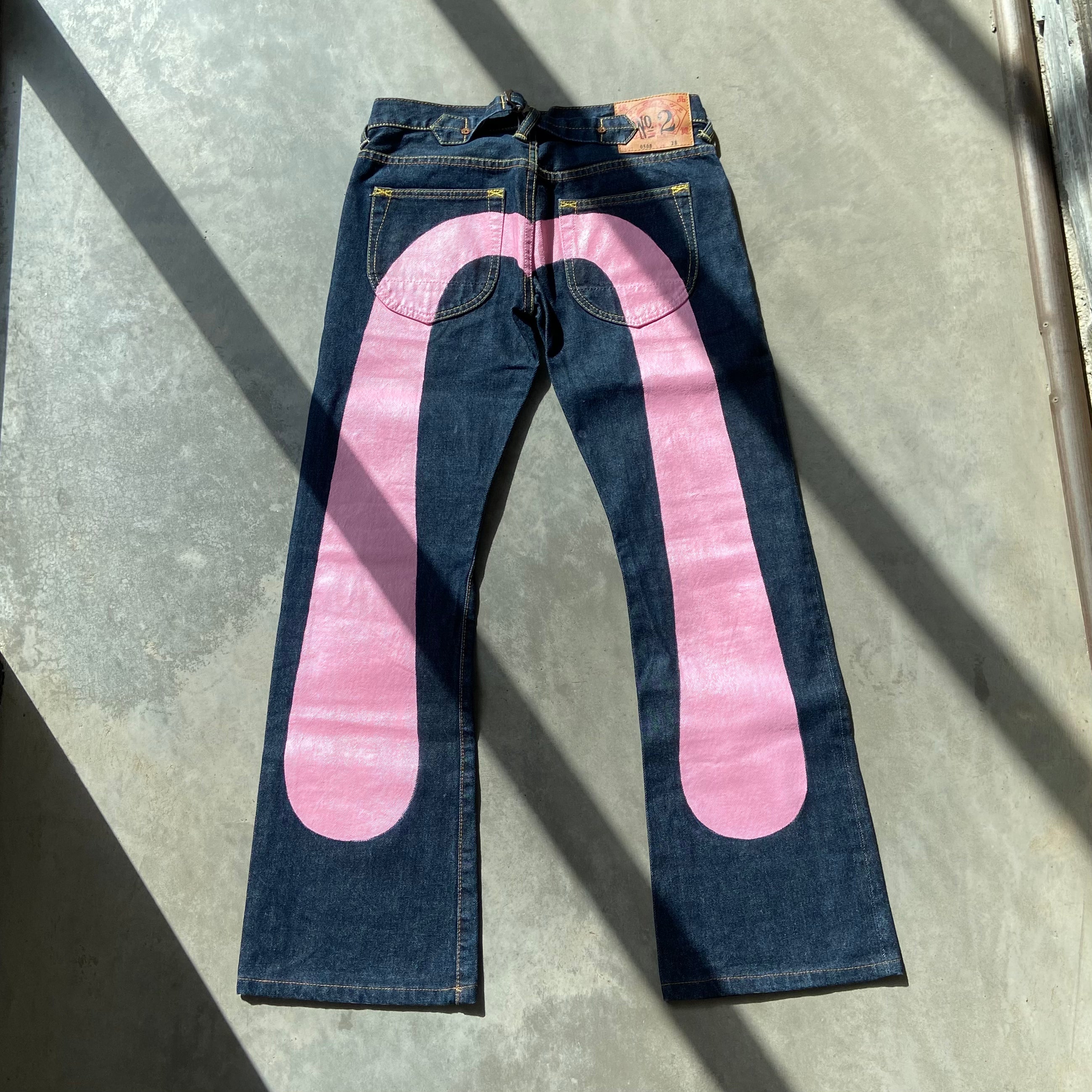 EVISU LOW-RISE PINK DAICOCK SELVEDGE JEANS - W27"