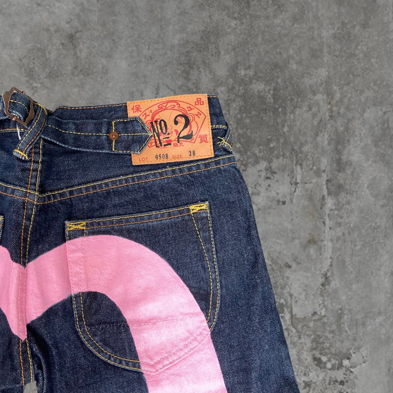 EVISU LOW-RISE PINK DAICOCK SELVEDGE JEANS - W27"